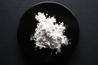 Ground glass pozzolan supplementary cementitious material